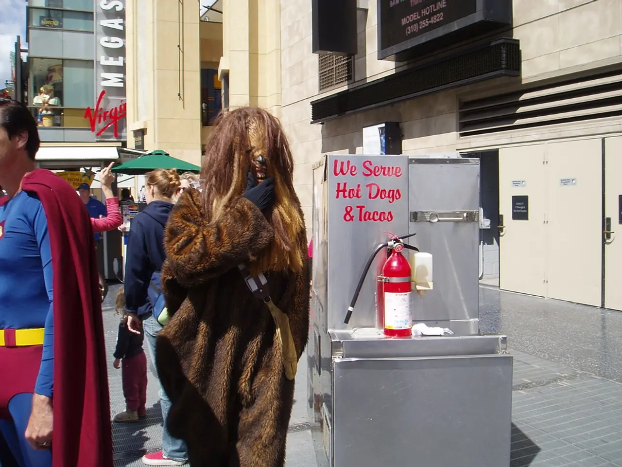 Emergency personnel extricate four feline residents from a blazing residential unit