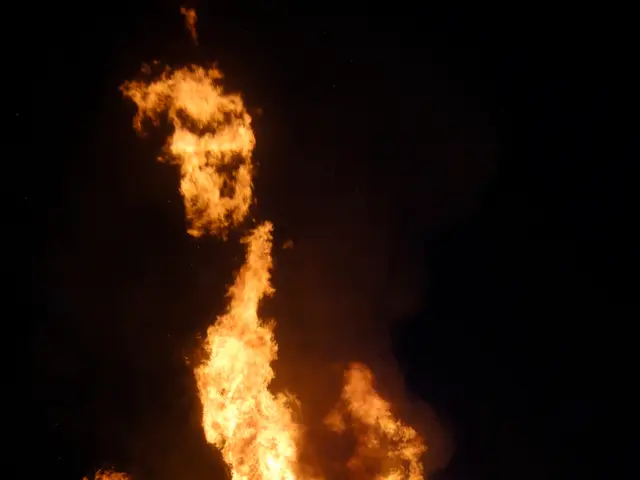 Basement Fire Spreads Across Residential and Business Buildings